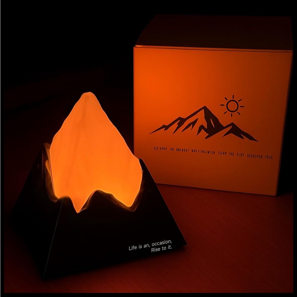 Mountain Night Light with Warm Orange Glow